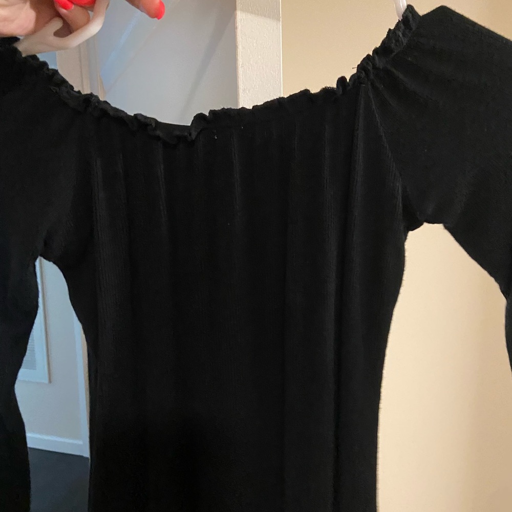 off the shoulder black ruffle top